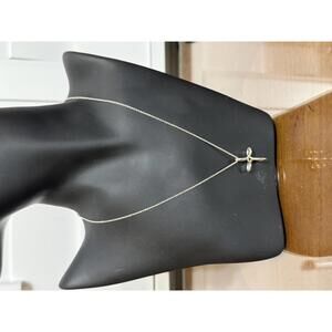 Tiffany & Co. Elsa Peretti Infinity Cross pendant necklace in sterling silver